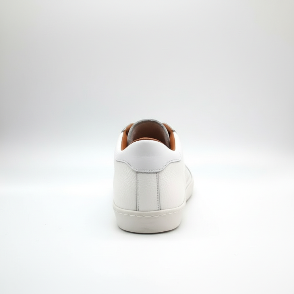 White artisanal sneaker back view